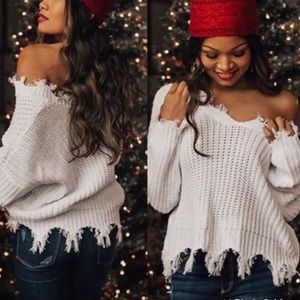 White oversized frayed sweater vneck tops
V-neck